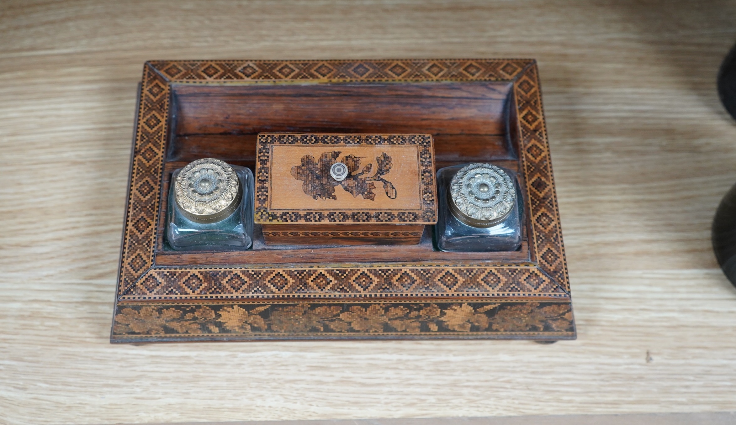 A Tunbridgeware rosewood inkstand with two glass ink bottles, 26cm wide. Condition - fair